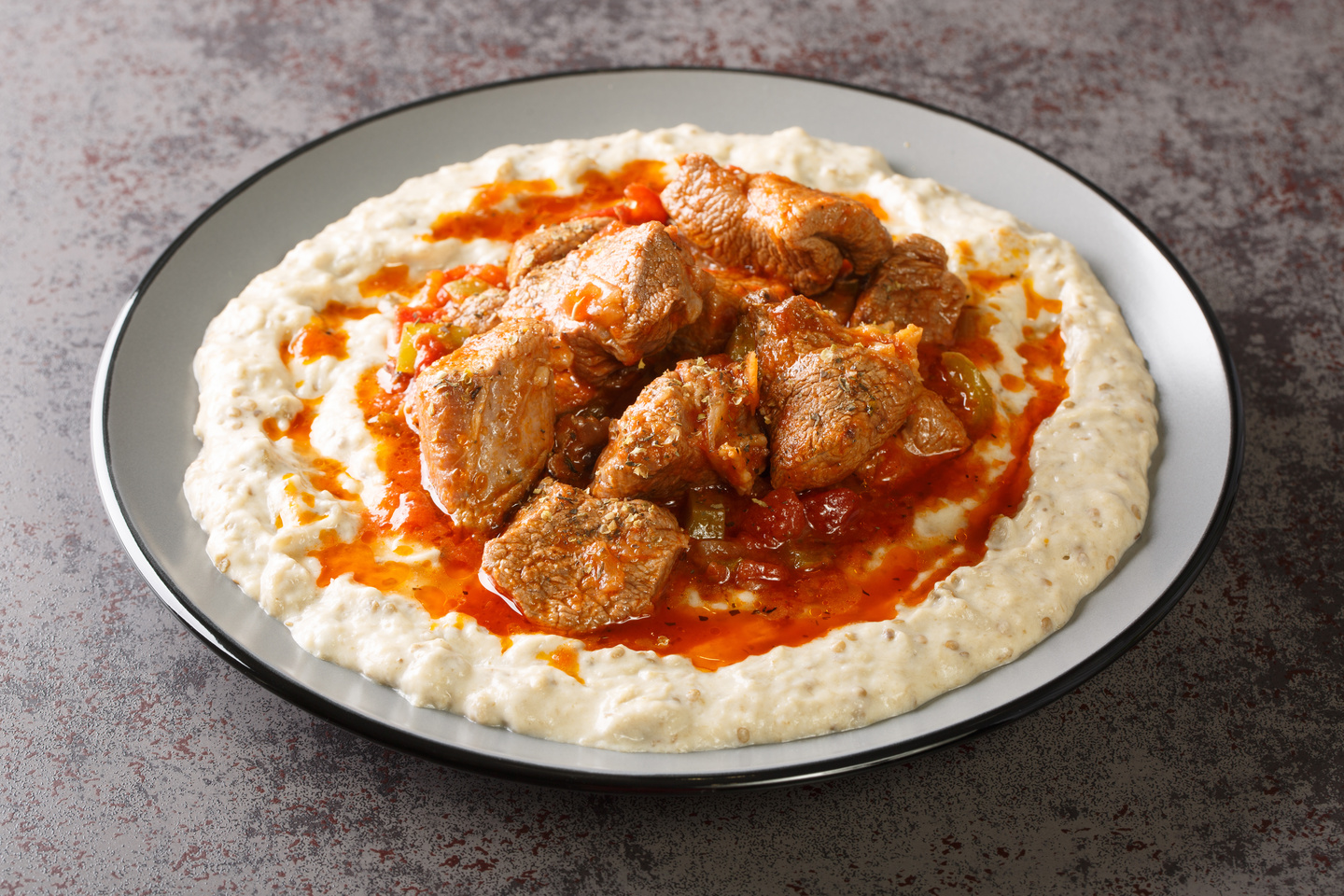 Sultan's Delight or Hunkar Begendi is a regal dish of smoked eggplant puree topped with tender, slow-cooked lamb or beef