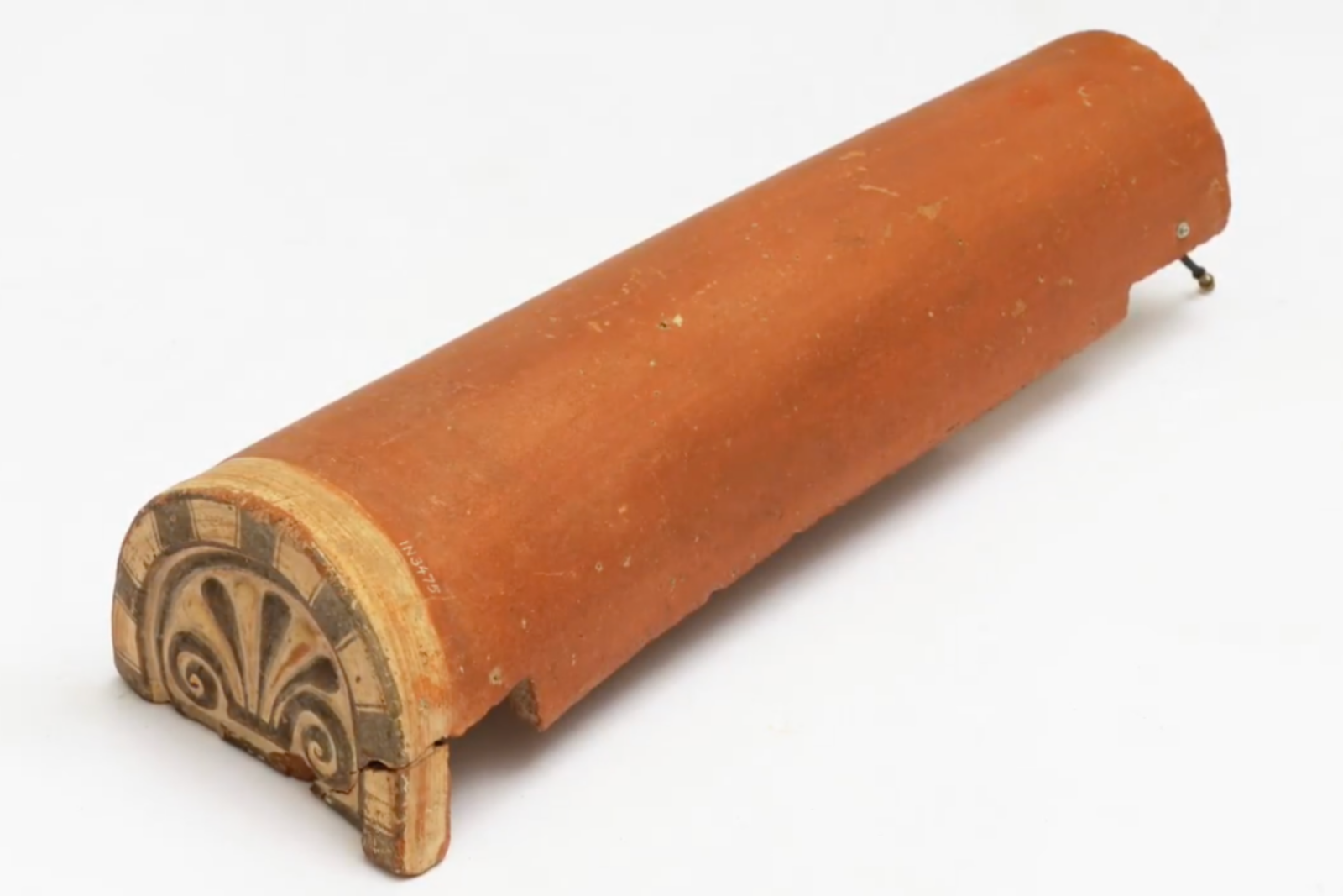 Cylindrical terracotta artifact from Duver, part of the items returned to Türkiye for their cultural significance