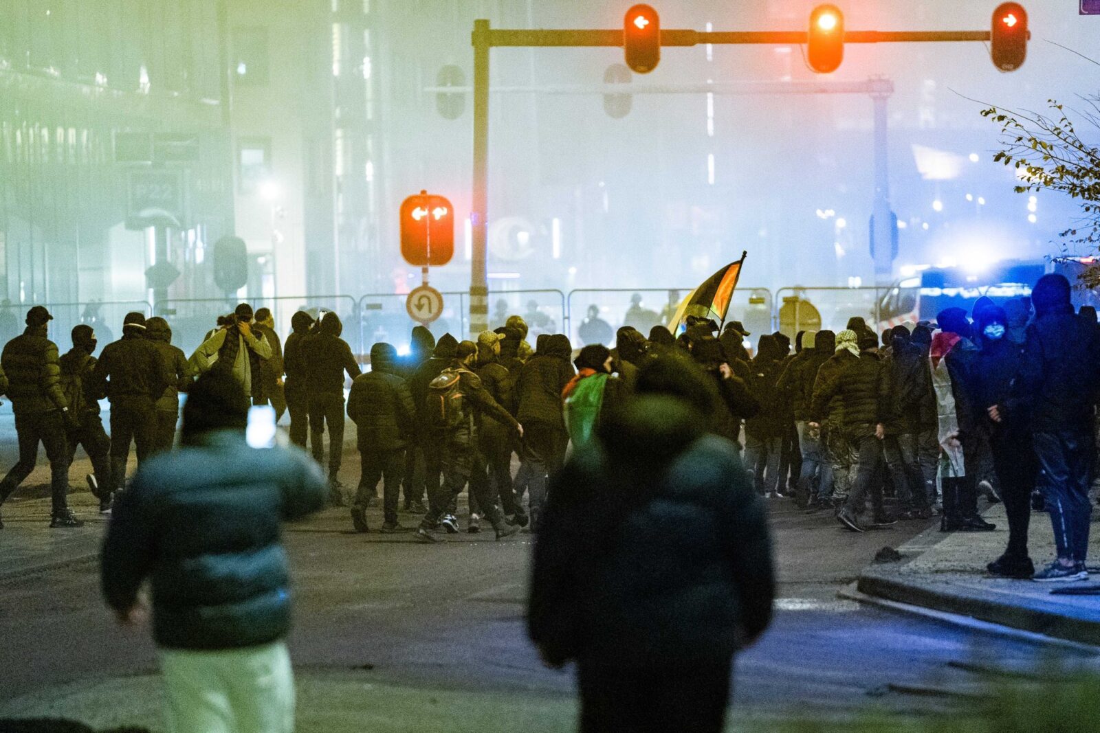 Maccabi Tel Aviv hooligans clash with locals in Amsterdam after Ajax match