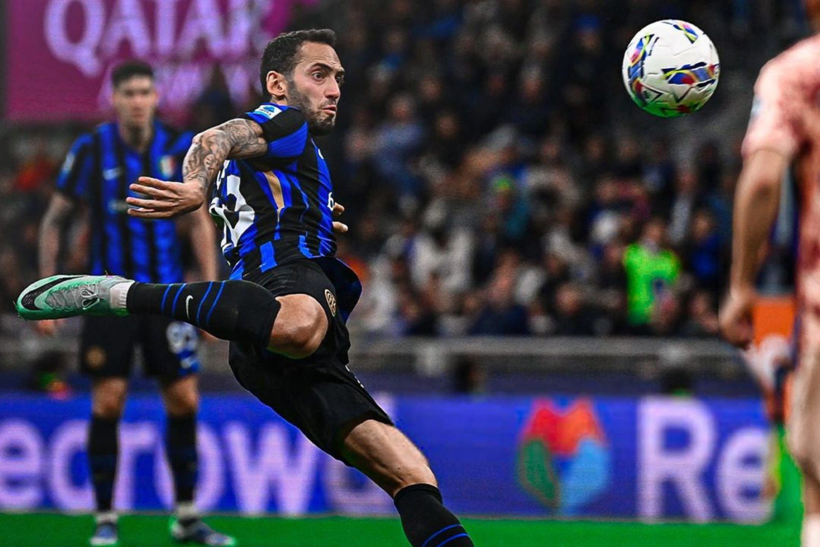 Hakan Calhanoglu delivers his signature kick during Inter's match