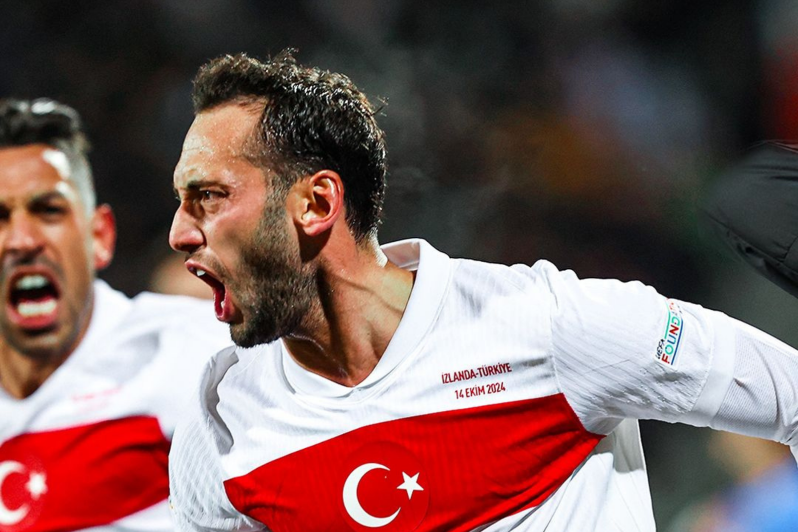 Hakan Calhanoglu passionately leads Türkiye during a national team match on October 15, 2024