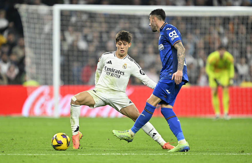 Arda Guler (L) of Real Madrid in action