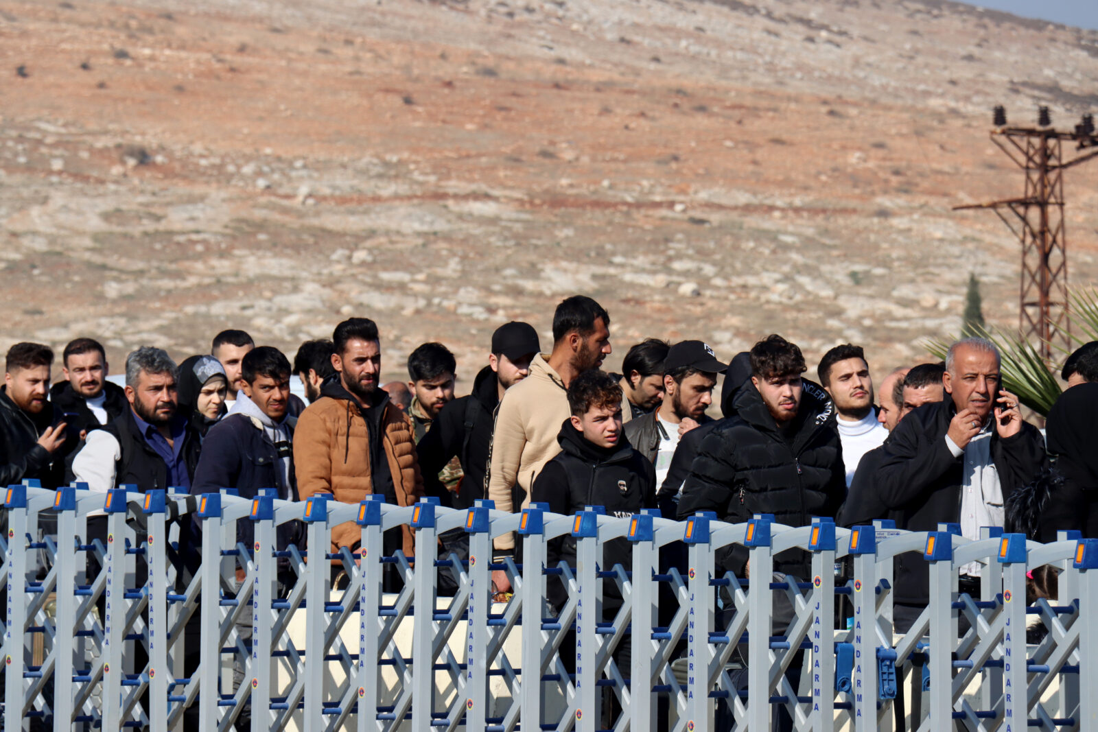 Syrians who took refuge in Türkiye during the civil war in their country gather at the Cilvegozu Border Gate in Hatay to return to Syria following the fall of the 61-year Baath regime