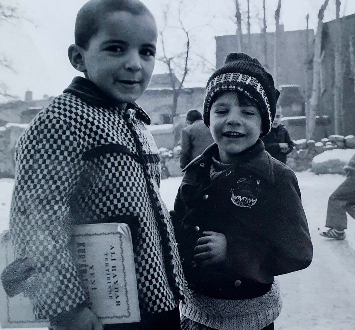 Original photograph of Ahmet Ozmen as a child alongside another boy