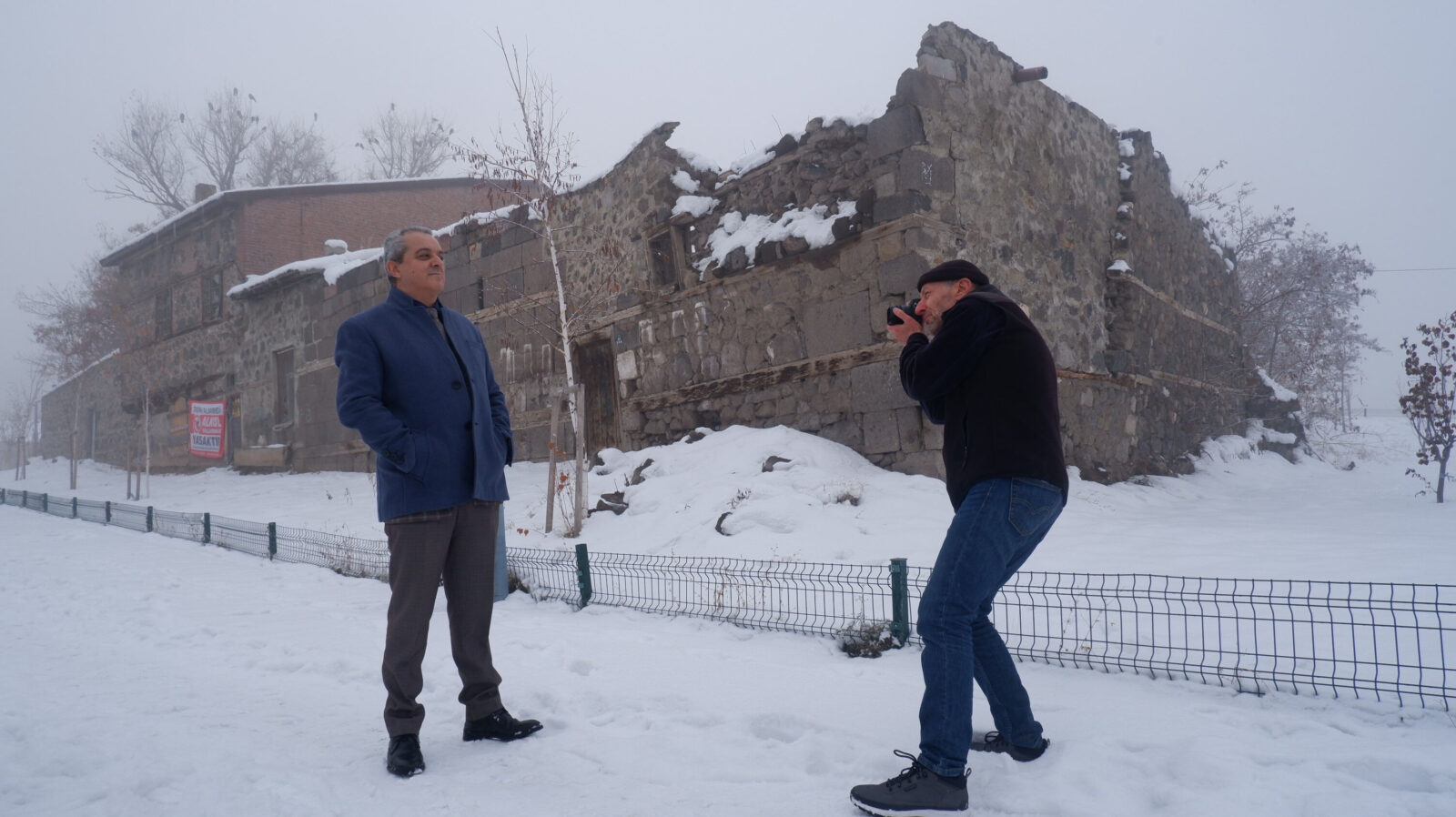 French anthropologist Victor Dallant takes a photo of Ahmet Ozmen at the same spot he photographed Ozmen as a kid 44 years ago