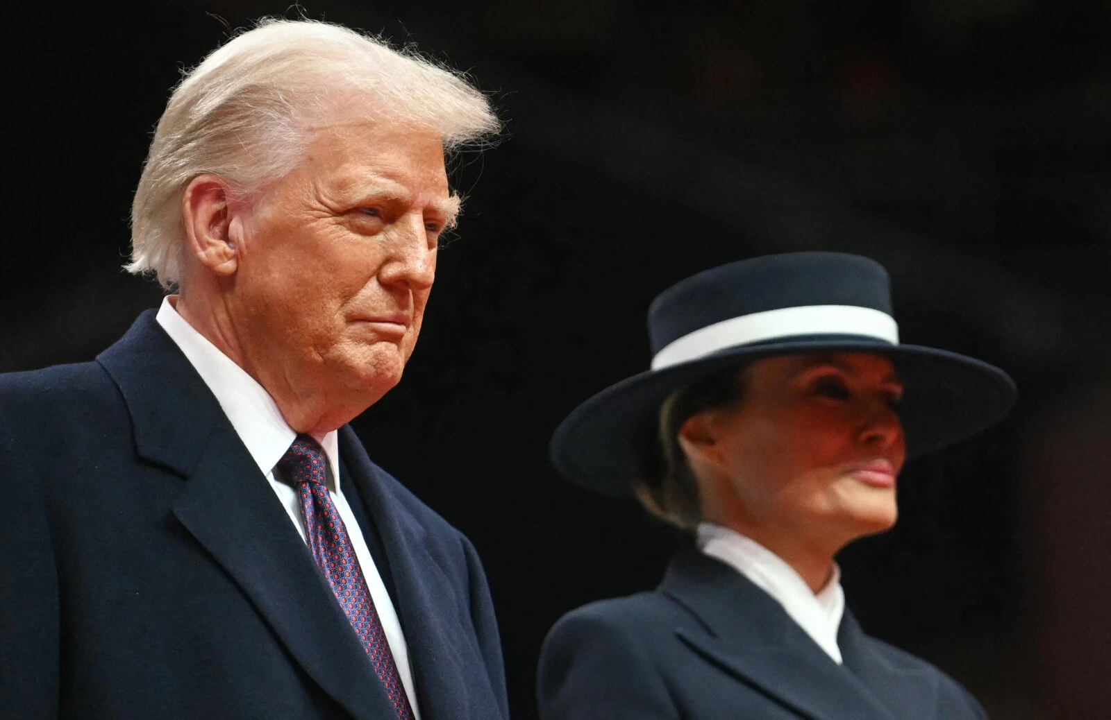 US President Donald Trump and First Lady Melania Trump Capital One Arena, watching bands perform during the inaugural parade in Washington, DC, on January 20, 2025."