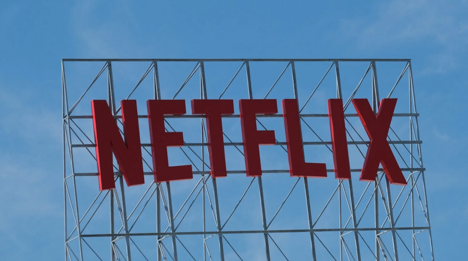 The Netflix logo is seen on top of their office building