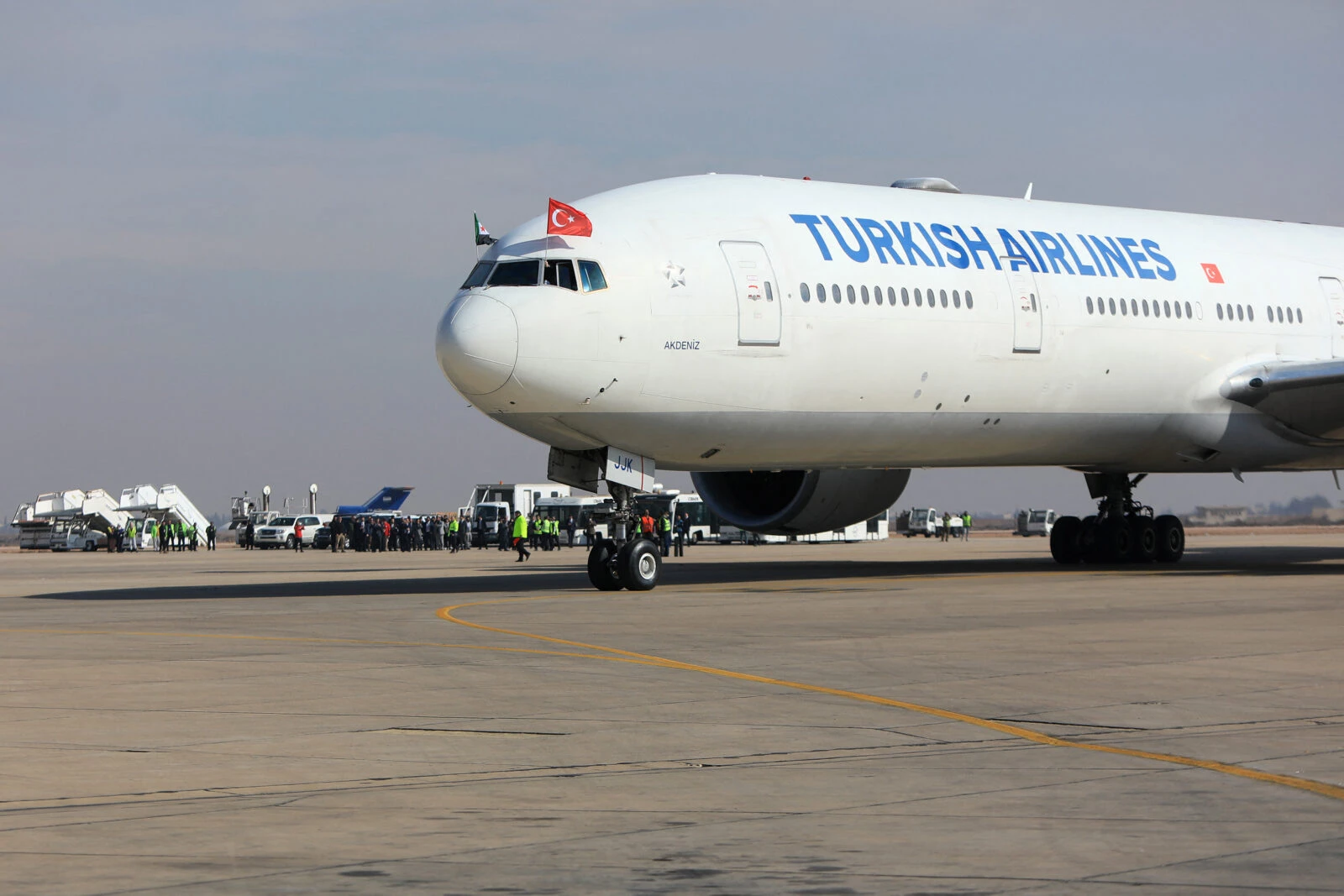 Passengers disembark from a Turkish Airlines aircraft carrying a diplomatic delegation from Ankara and an aid shipment provided by the Turkish Red Crescent, at the Damascus International Airport in the Syrian capital on Jan. 23, 2025. (AFP Photo)