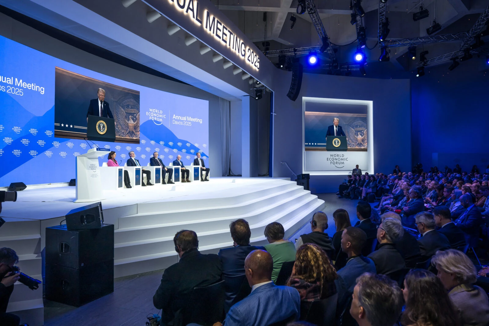 US President Donald Trump is seen on a large screen during his address by video conference at the World Economic Forum (WEF) annual meeting in Davos. (AFP Photo)