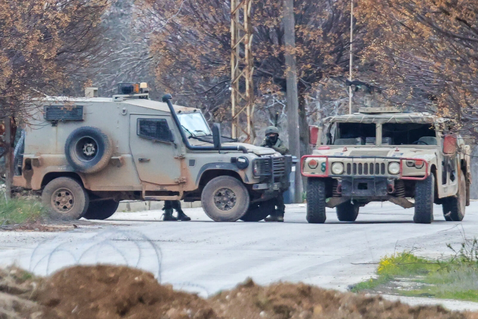 sraeli soldiers guard a roadblock in Borj El Mlouk on January 26, 2025, during clashes with south Lebanon residents returning home