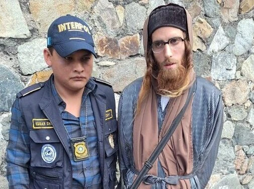 Yoel Alter, leader of Lev Tahor, is escorted by Interpol officers following his arrest for child abuse and human trafficking in Guatemala on January 29, 2025.