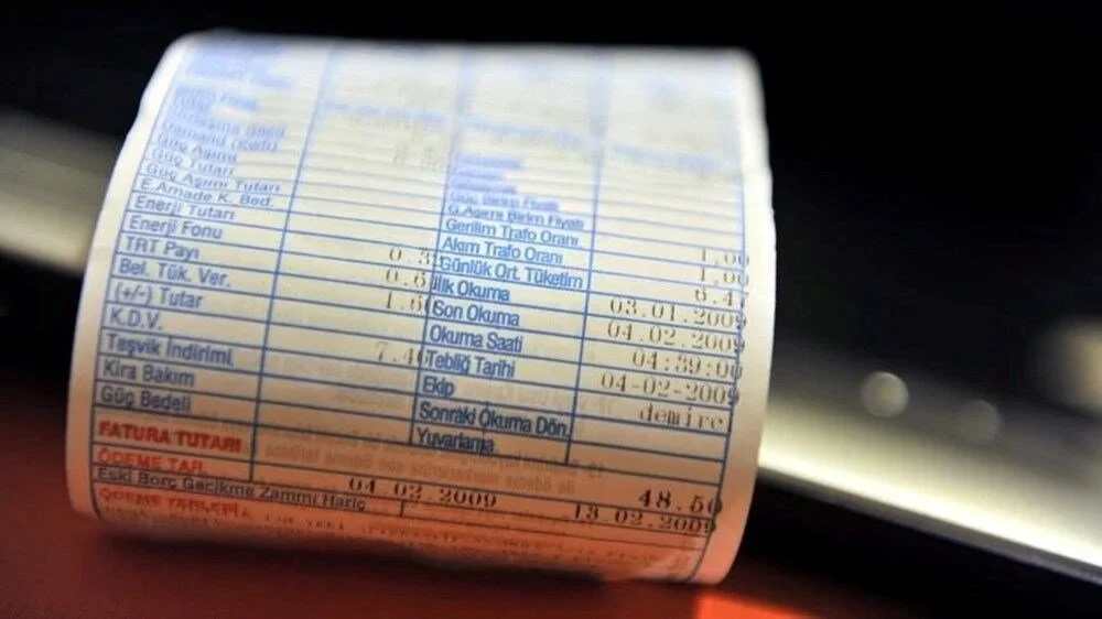 File photo shows a close-up of a printed electricity bill in Türkiye. (IHA Photo)