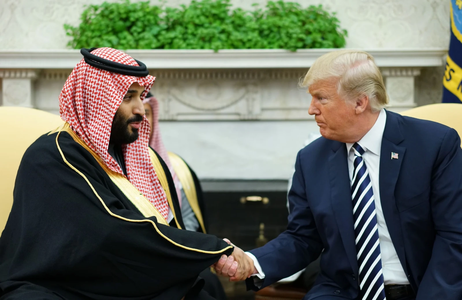 U.S. President Donald Trump shakes hands with Saudi Crown Prince Mohammed bin Salman at the White House