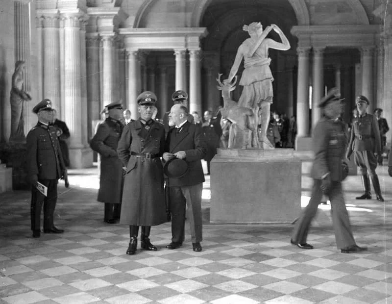 A historical photo showing Nazis inside the Louvre Museum.