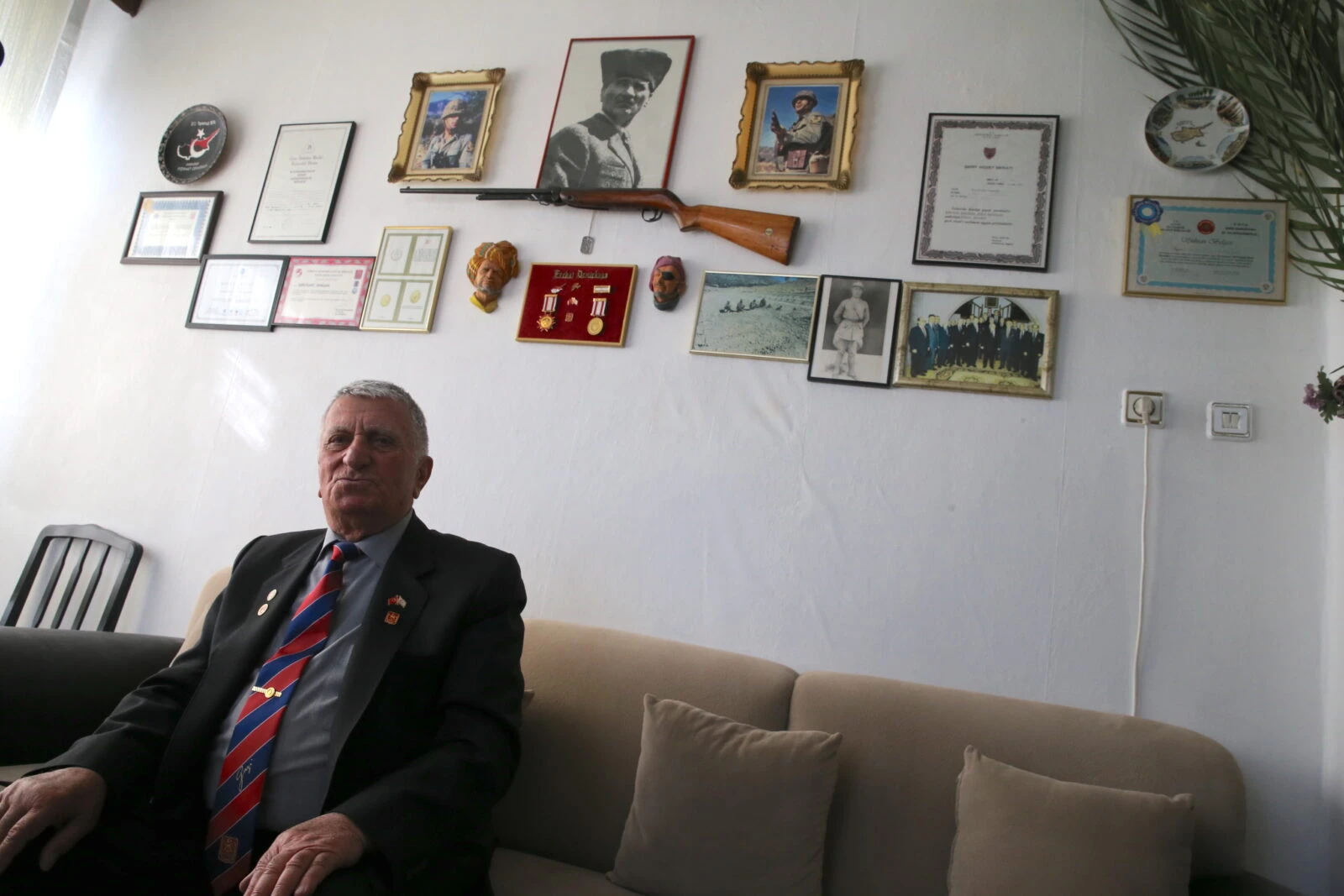 Ferhat Demirkaya, a Cyprus war veteran, reflecting on his memories from the frontlines in Konya.