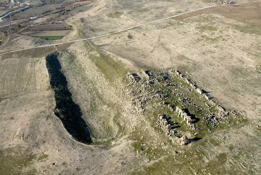 Aerial view of Laodicea Stadium in Denizli, Türkiye, surrounded by lush landscapes.