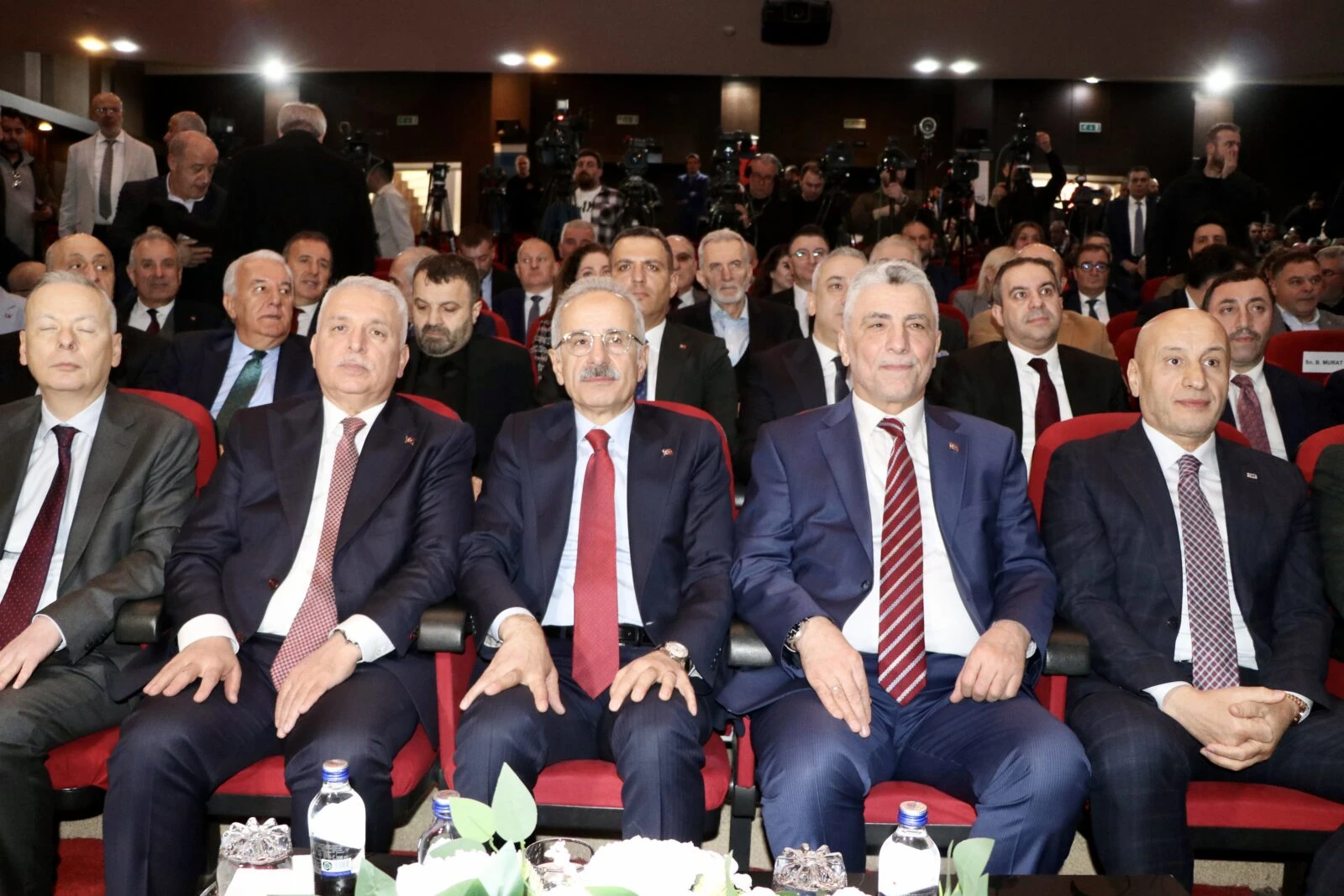 Türkiye's Trade Minister Omer Bolat (second from right), Minister of Transport and Infrastructure Abdulkadir Uraloglu (center), and Turkish Exporters Assembly (TIM) Chairman Mustafa Gultepe