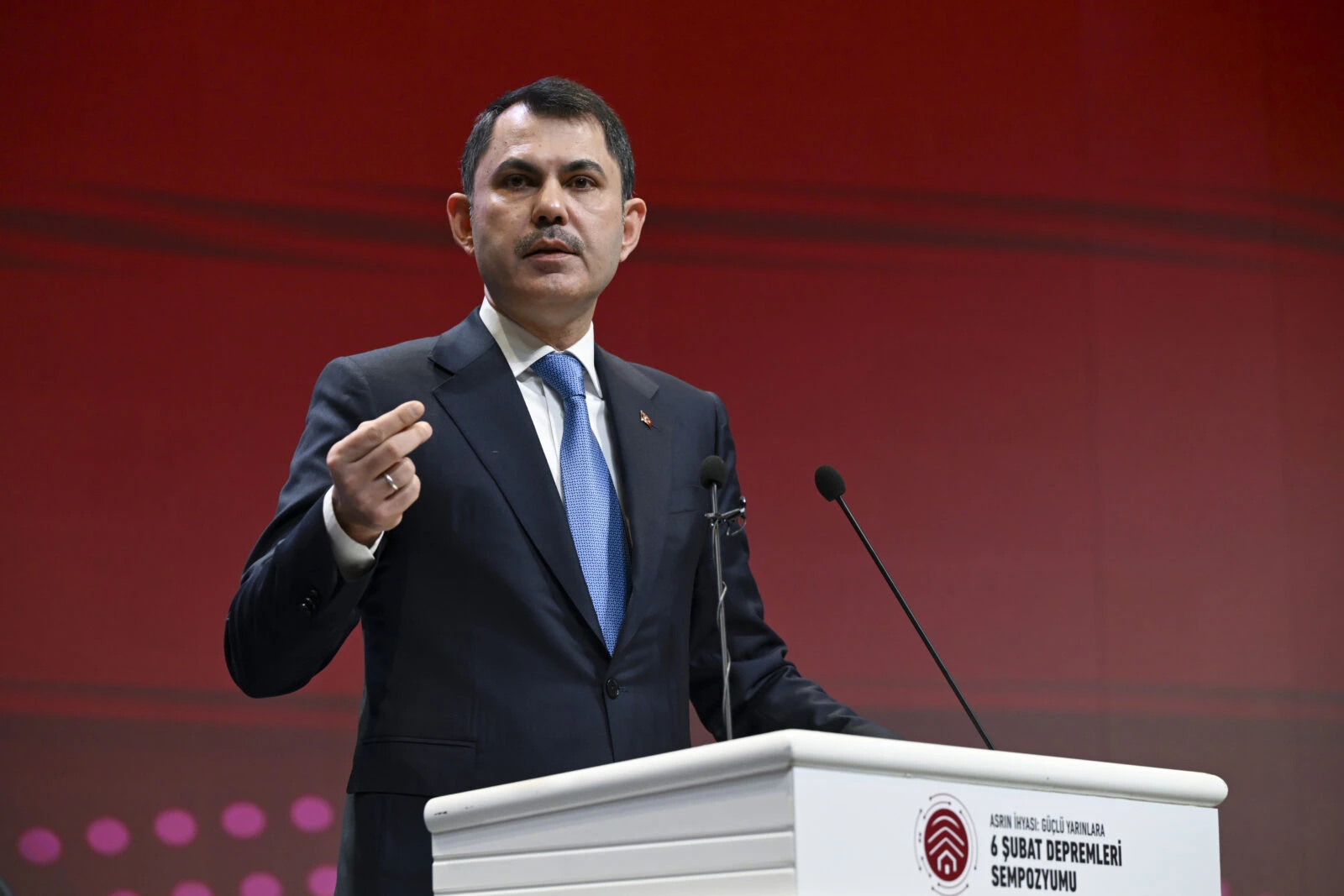 photo shows Turkey Minister of Environment, Urbanization and Climate Change Murat Kurum gesturing as he speaks on a podium