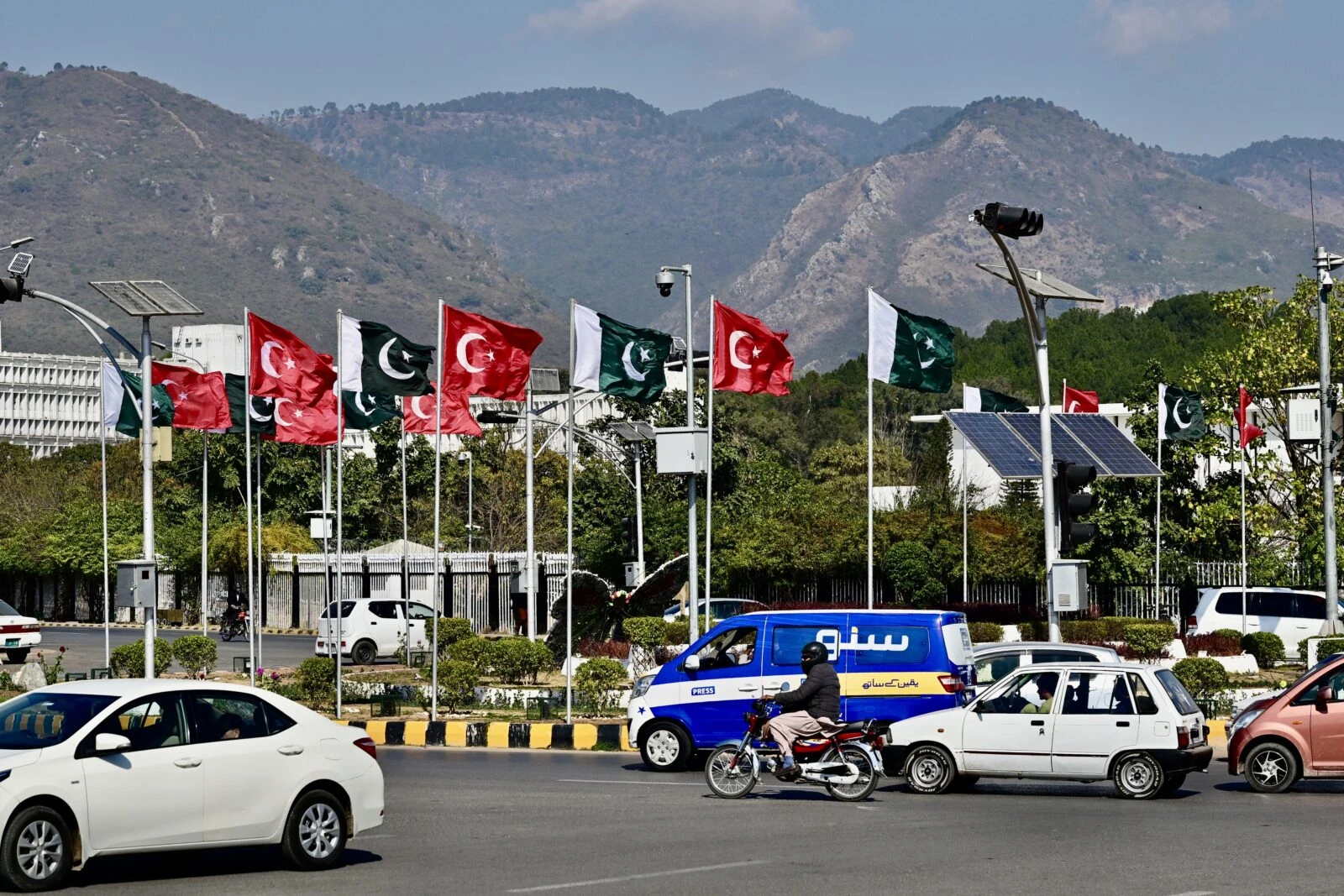 Photo shows Turkey and pakistan flags on islamabad streets