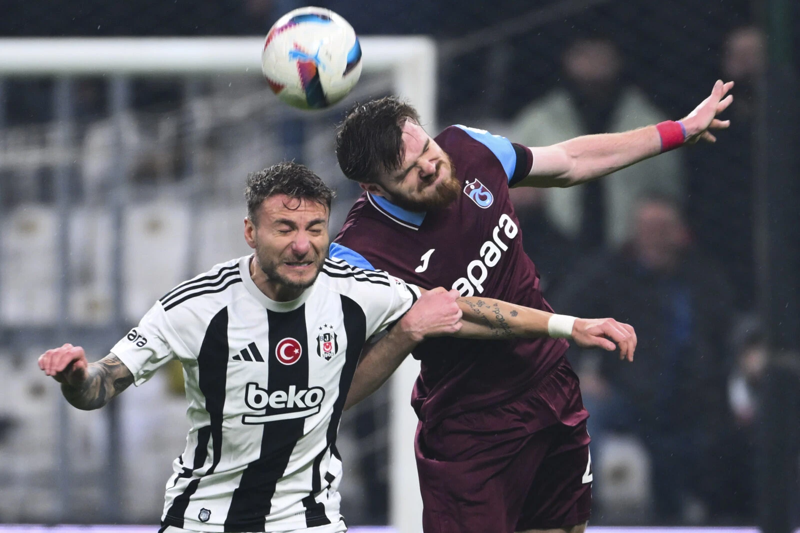 Photo shows Ciro Immobile (L) of Besiktas and Huseyin Turkmen (R) of Trabzonspor.