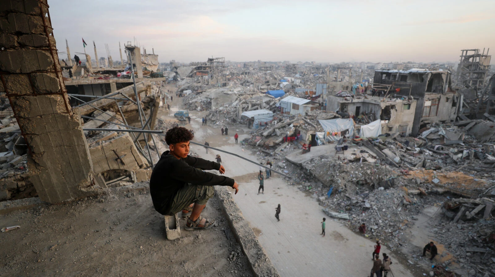 Photo shows a Palestinian kid amid rubbles