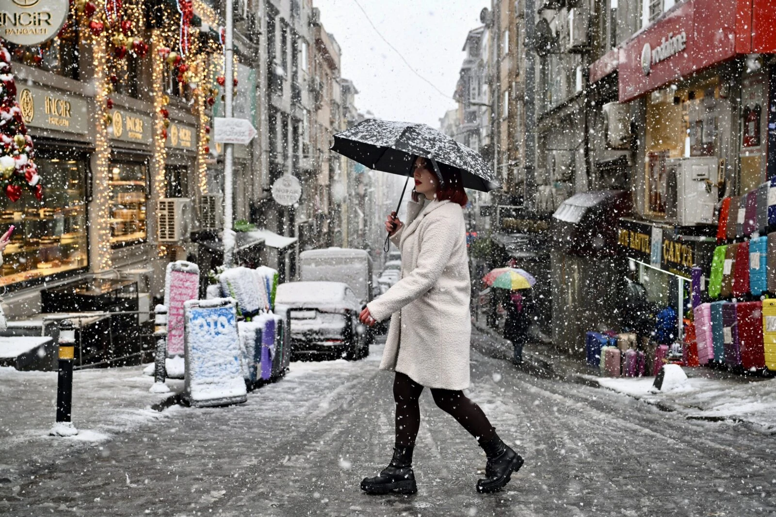 People walking in the snow in Şişli, Istanbul.