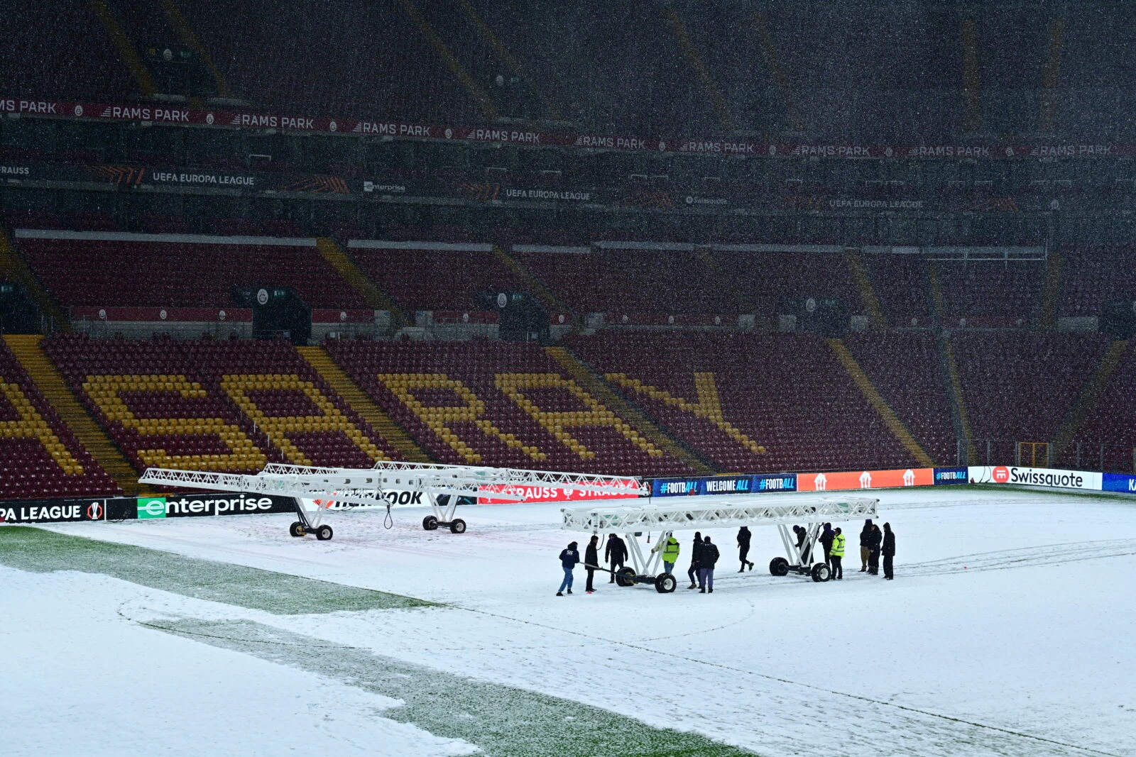 Players of Galatasaray take part in a training session held on artificial turf pitch due to heavy snow 