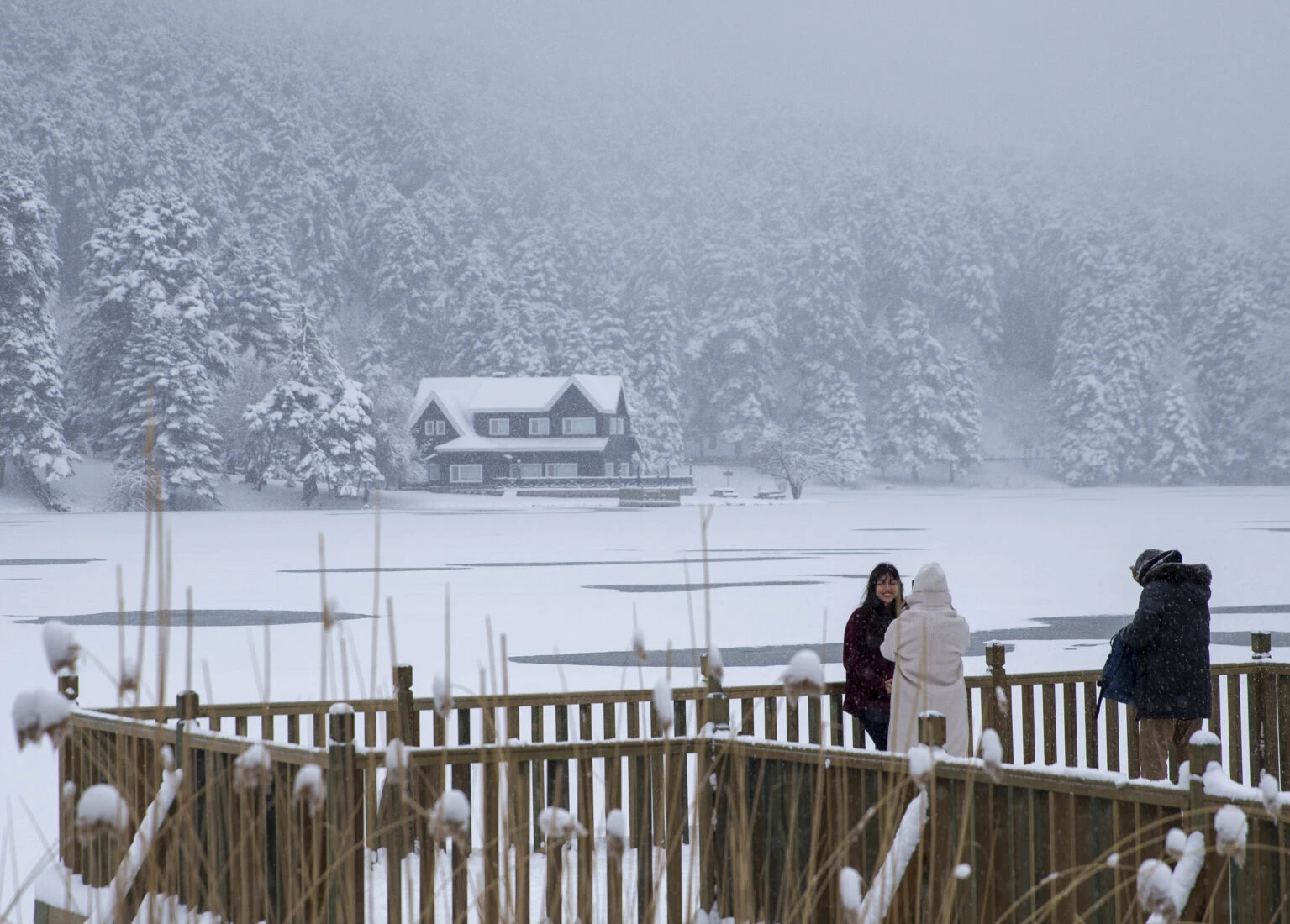 People visit the snow covered Golcuk Nature Park