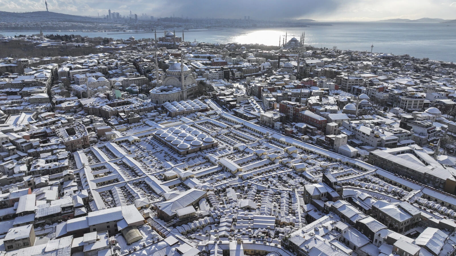 An aerial view of the snow-covered Grand Bazaar and its surrounding streets as the snow continues in Istanbul.