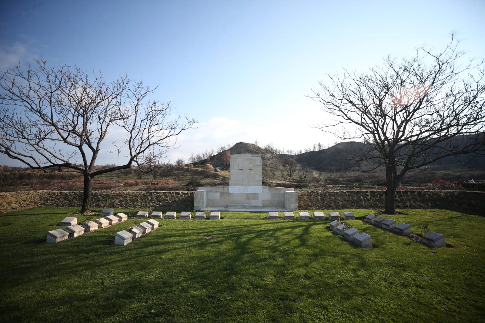 Foreign soldiers' cemetery and monument in Gallipoli Peninsula showing the aftermath of the forest fire on August 15th.