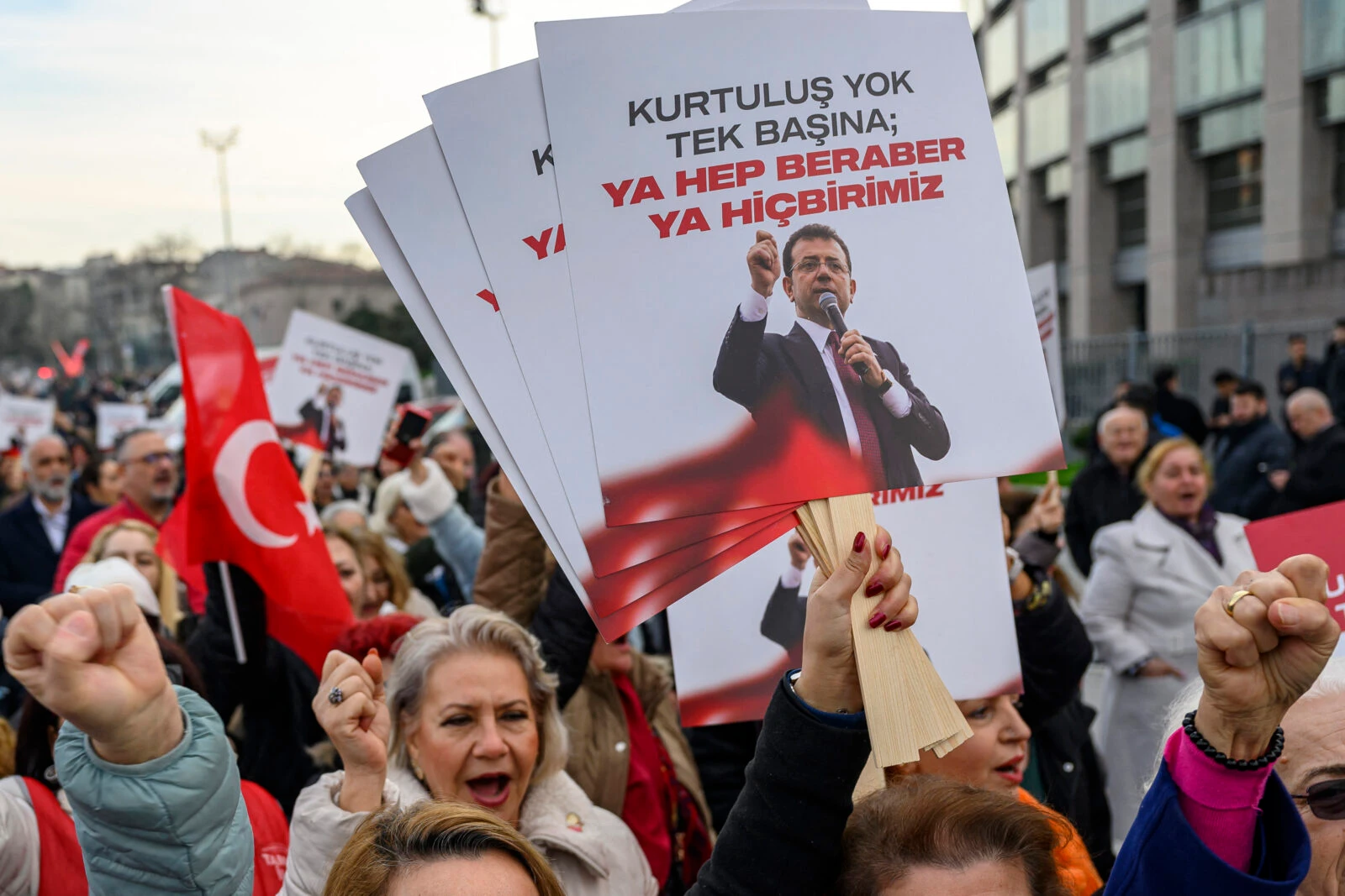 Supporters of Ekrem Imamoglu shout slogans