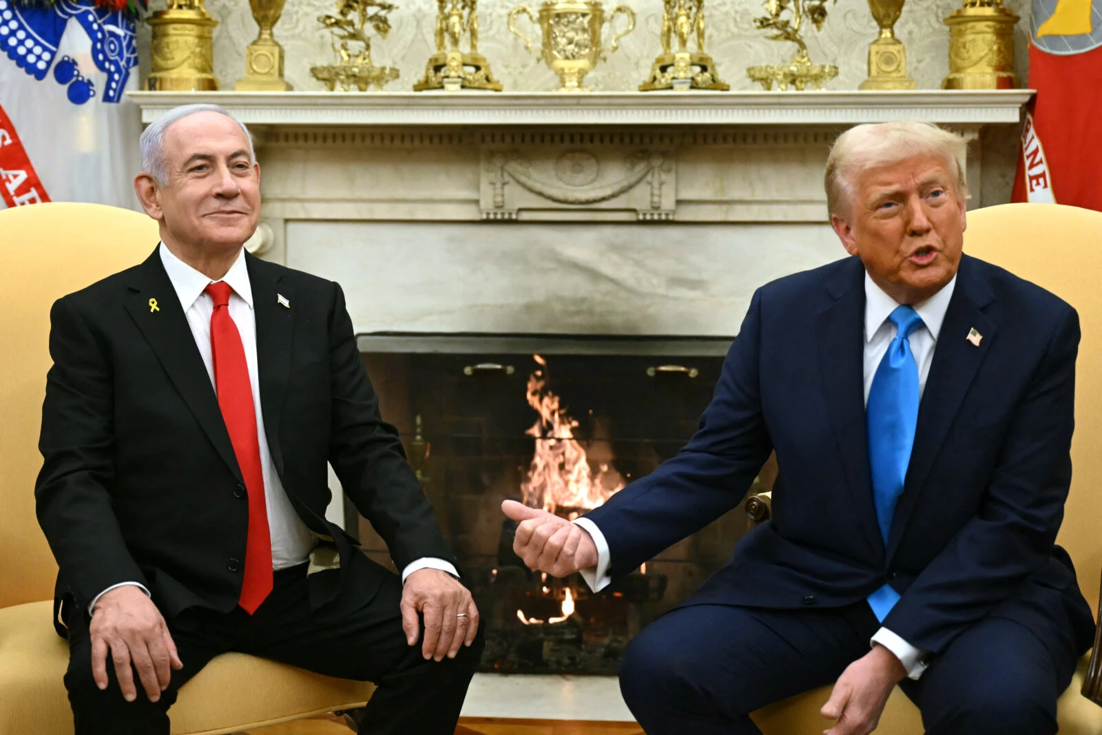 Photo shows U.S. President Donald Trump (R) meet with Israel's Prime Minister Benjamin Netanyahu.