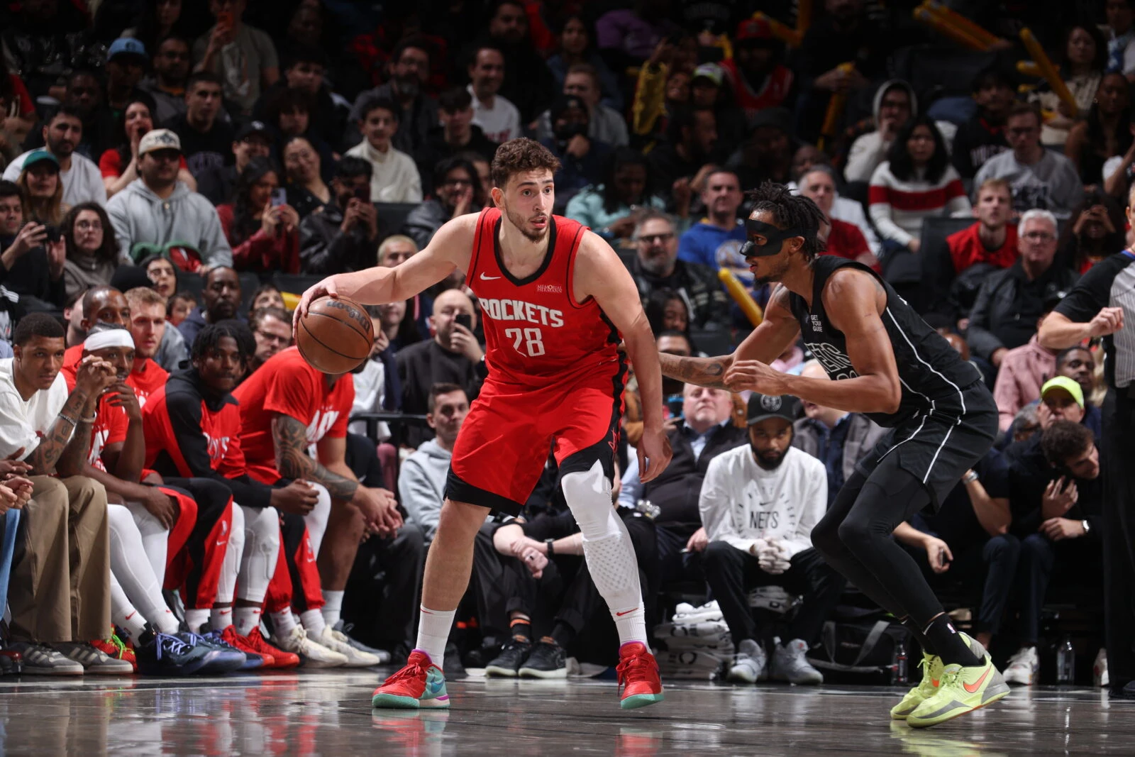 Alperen Sengun (#28) of the Houston Rockets handles the ball during the game against the Brooklyn Nets