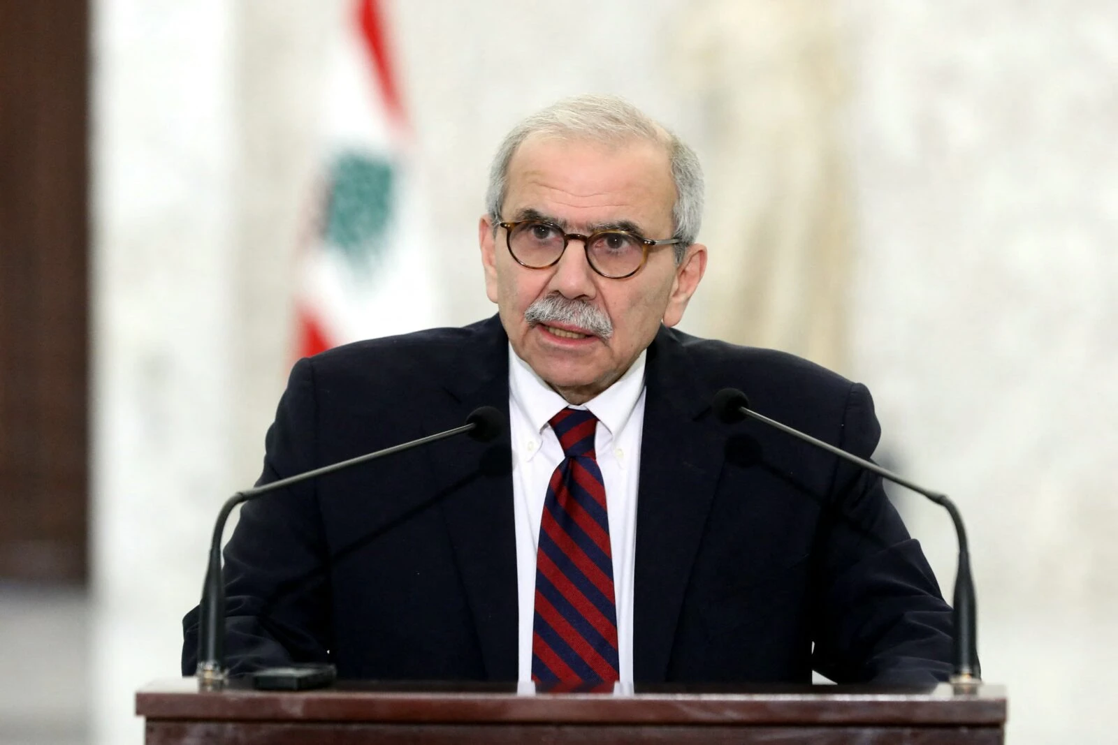 Lebanese Prime Minister Nawaf Salam delivering a statement to the press