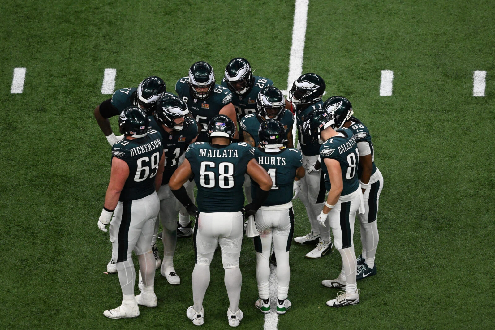 photo shows eagles huddle in super bowl 2025