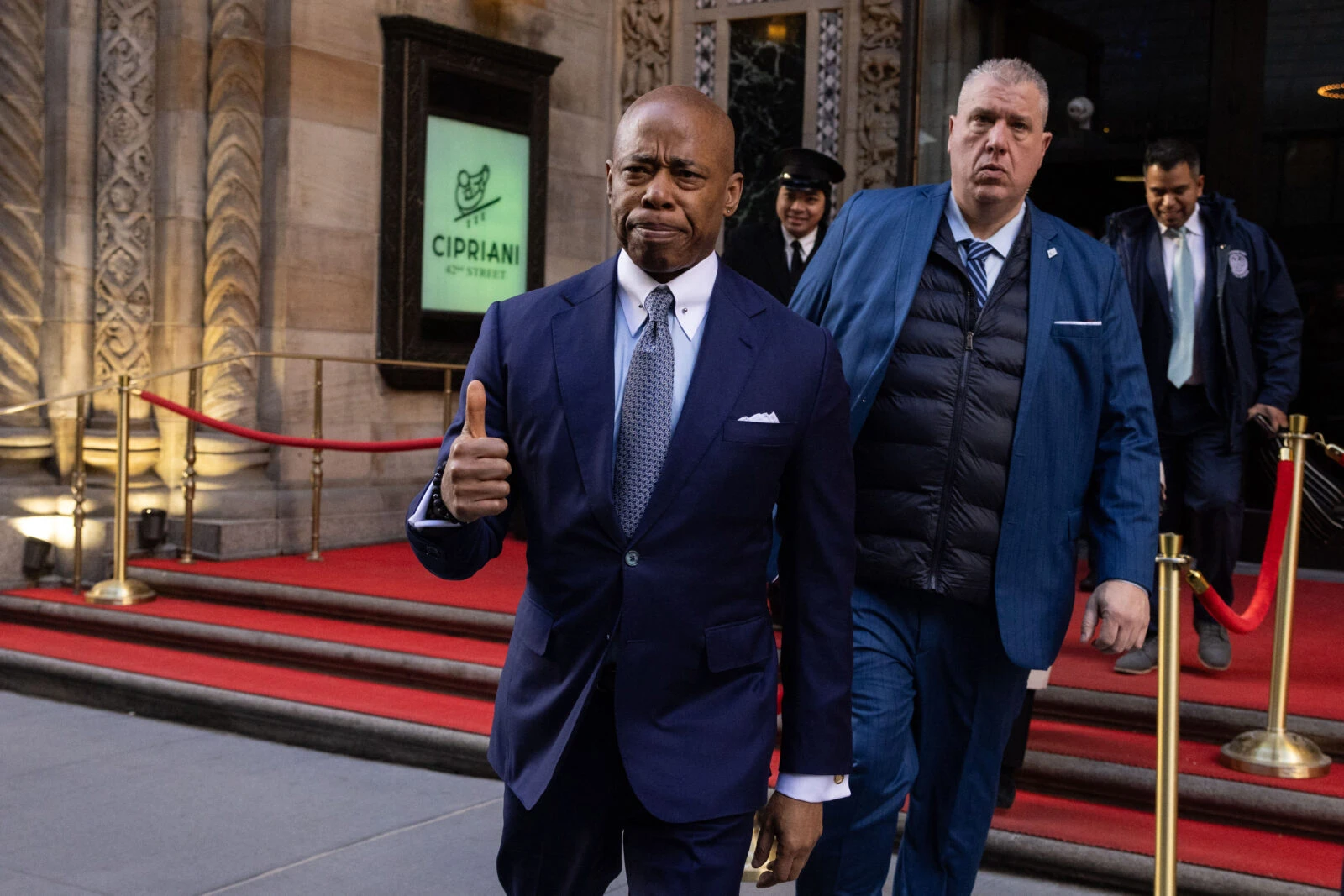 Photo shows nyc mayor eric adams gesturing with thumbs up