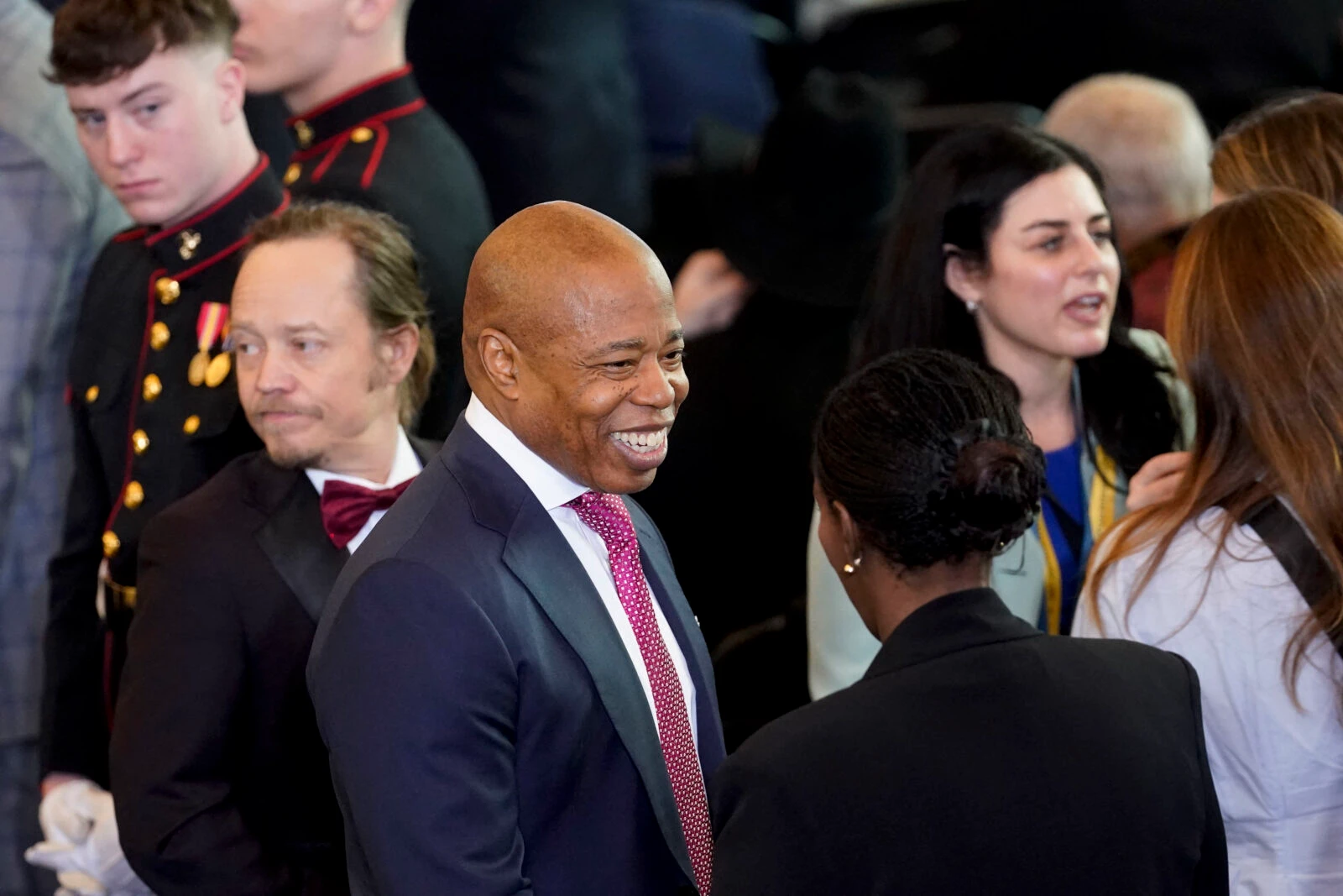 Photo shows NYC Mayor eric adams smiling at 2025 trump inaguration