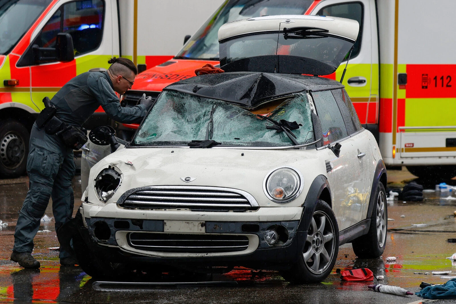 A police officer works at the scene