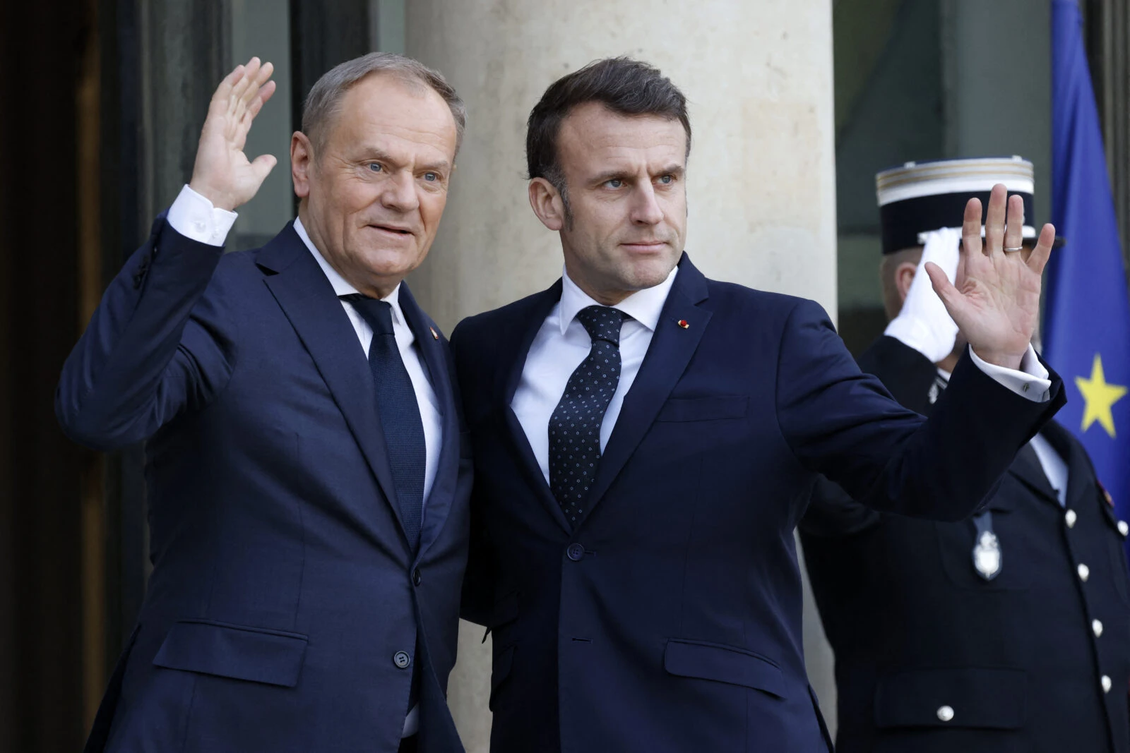 French President Emmanuel Macron welcomes Poland's Prime Minister Donald Tusk 