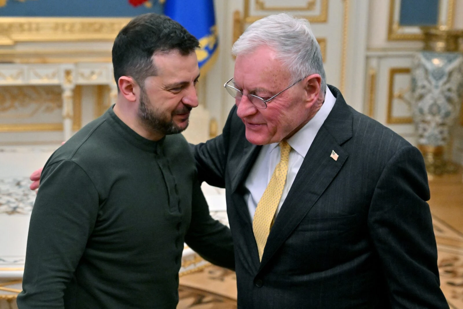 Ukraine's President Volodymyr Zelensky (L) greets US envoy Keith Kellogg 