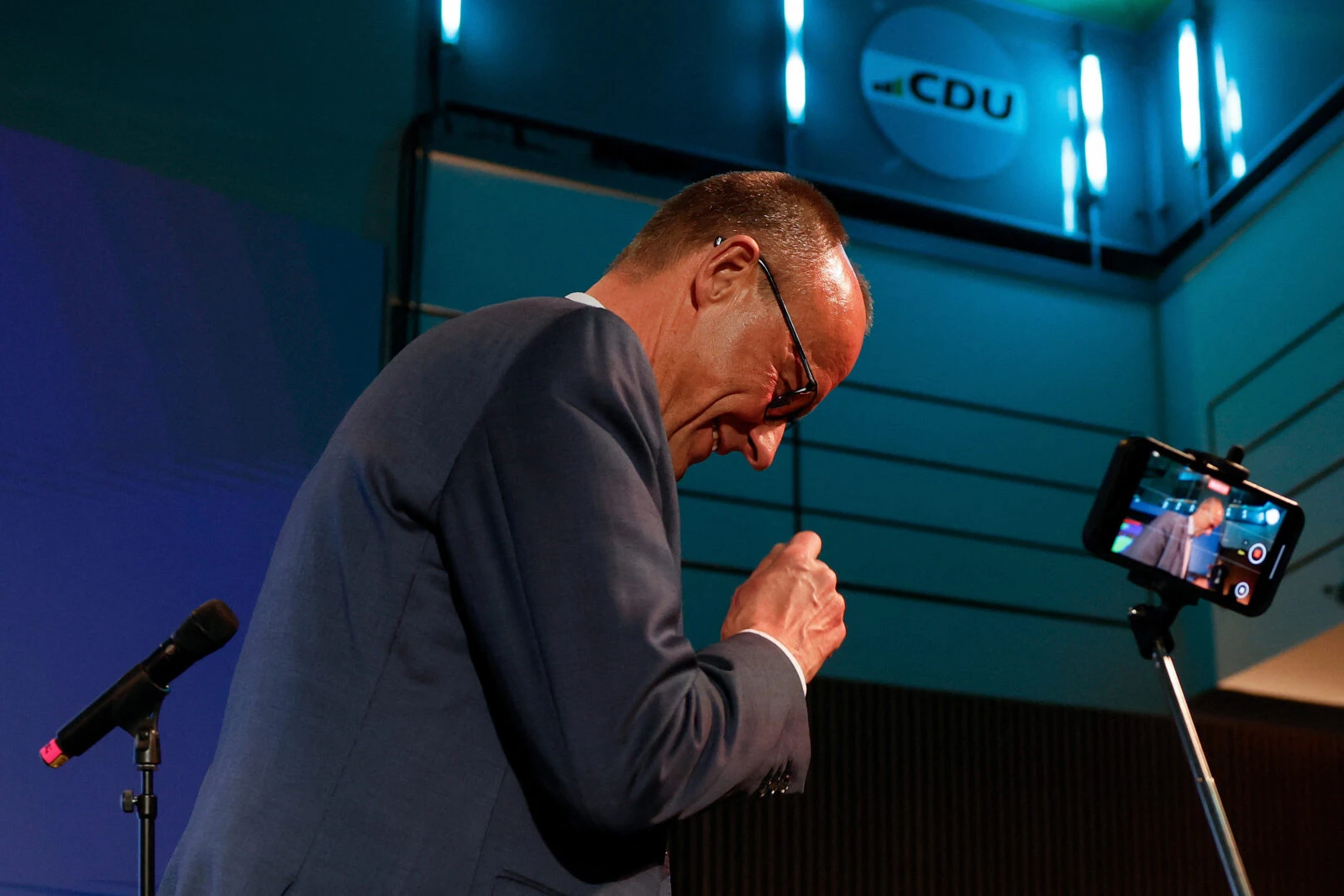 Photo shows Friedrich Merz, leader of Germany's conservative Christian Democratic Union (CDU) and his party's main candidate for Chancellor smiles as he walks off stage