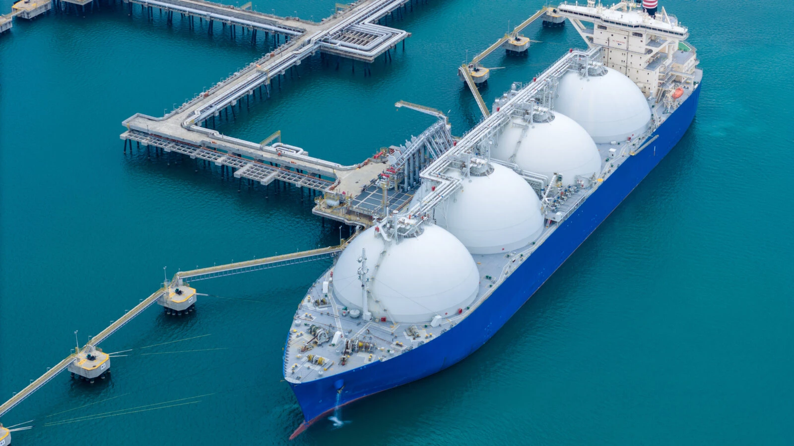 Photo shows LNG (Liquified Natural Gas) tanker anchored in Gas terminal gas tanks