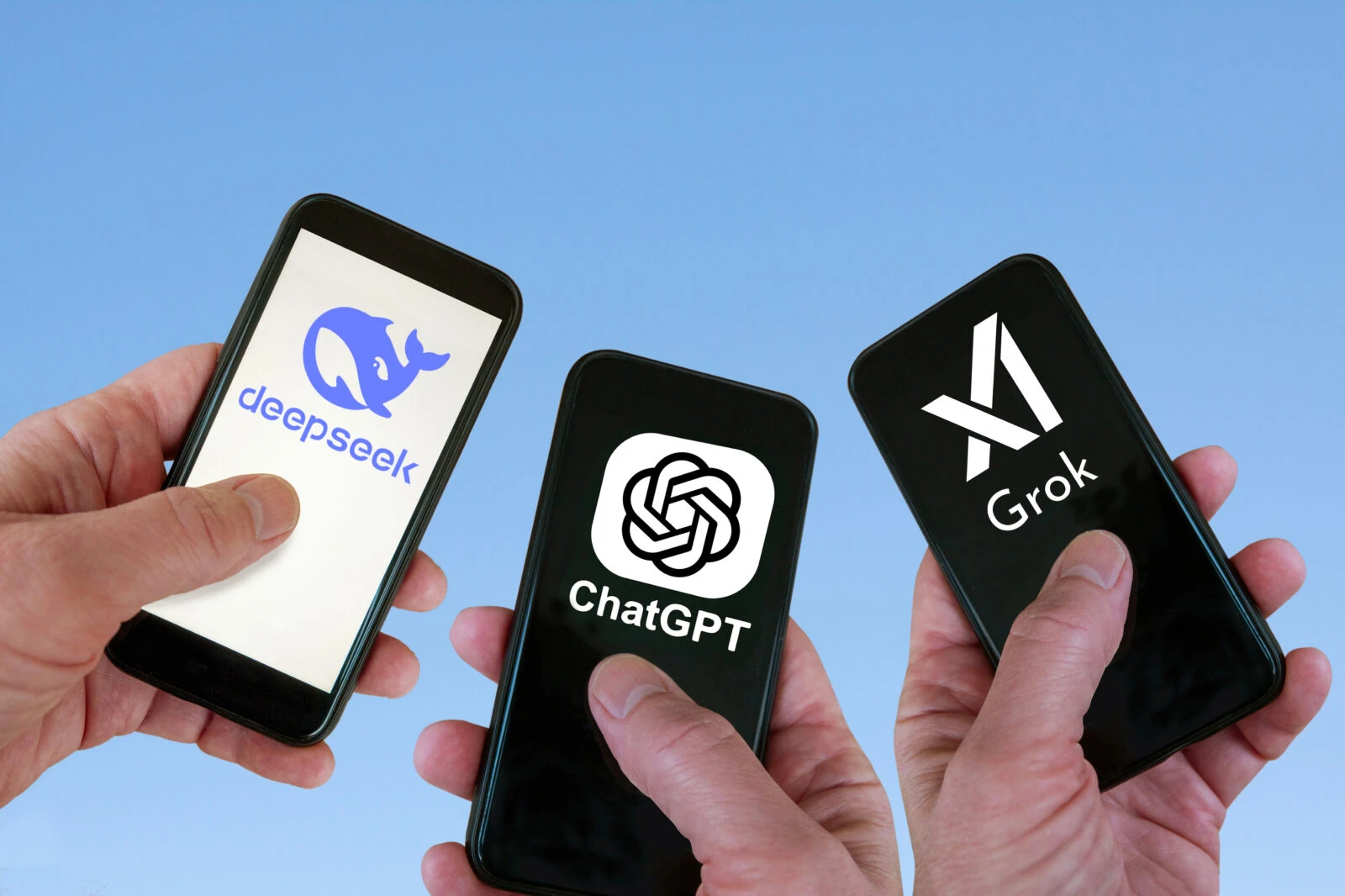 DeepSeek ChatGPT Open AI and Grok logos on smartphone screens