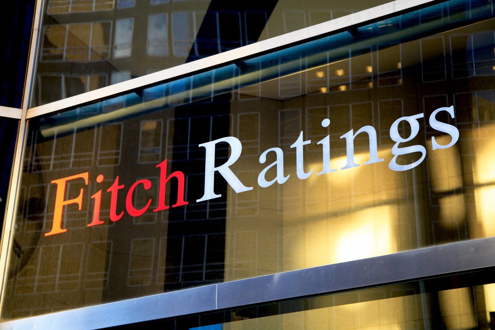 File photo shows the exterior of a Fitch Ratings office in New York, U.S, featuring the company's logo on a glass window. 