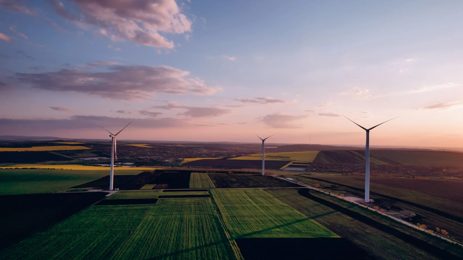 Windmill turbines generating green energy electric.Green energy