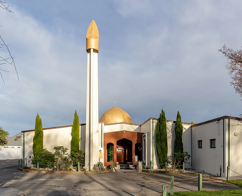 A view of the Christchurch Mosque in Christchurch, New Zealand, with a clear sky in the background.