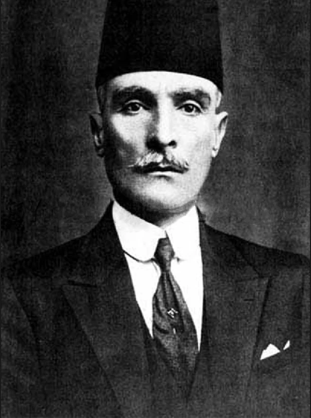 A black and white portrait of Ibrahim Hananu, dated 1932. The image is a historical photograph showing his likeness.