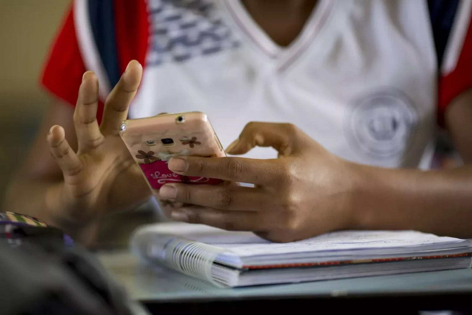 A girl looks at her phone