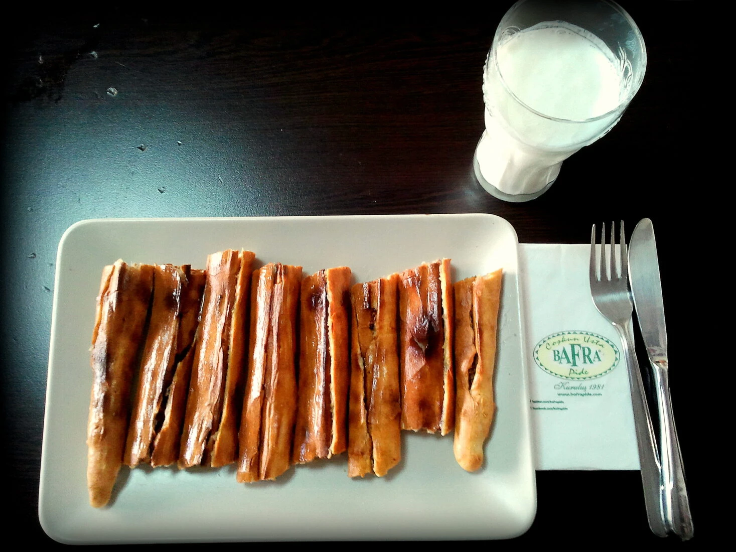 Braised beef in traditional Bafra pita and ayran