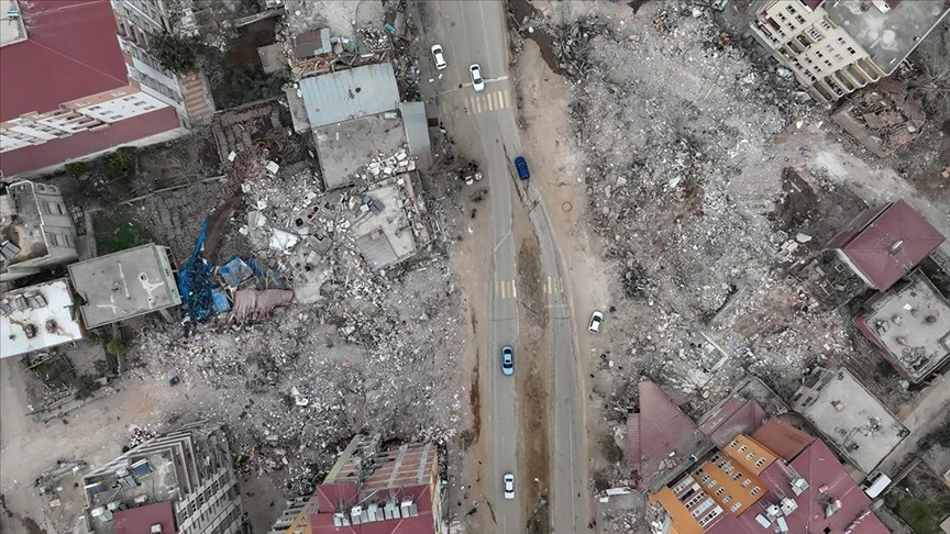 collapsed buildings and widespread destruction